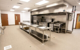 Food prep area with new stainless kitchen equipment